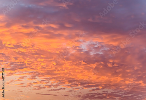 Sunset sky background with tiny clouds. Colorful sunset sky © 기섭 이