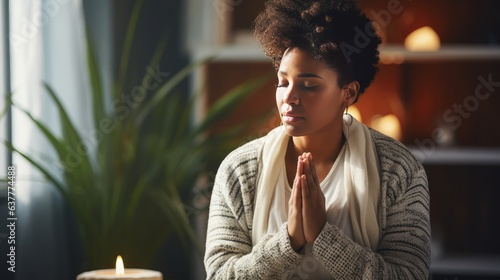 Black woman praying or meditating