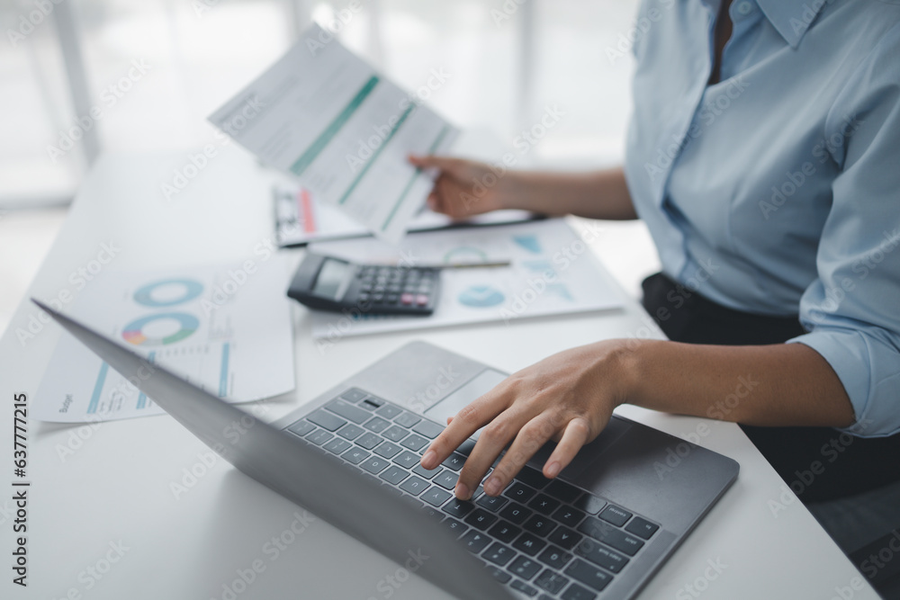 Person working with documents on desk, accountant checking company budget accounting documents, auditing financial statements, preparing company balance sheet financial statements. Audit concept. - obrazy, fototapety, plakaty 