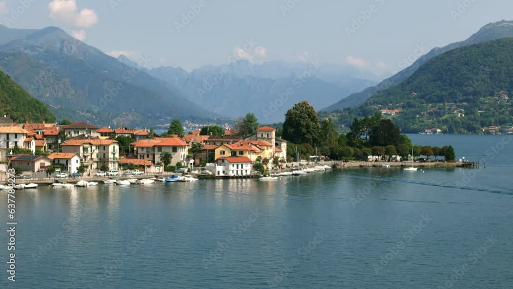 Picturesque Italian Pella town on Lake Orta in Piedmont region of Italy. Aerial rising view Picturesque Italian Pella town on Lake Orta in Piedmont region of Italy. Aerial rising view