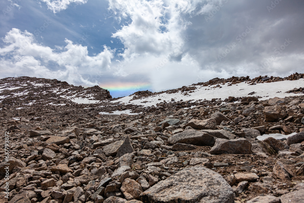 An unusual phenomenon high in the mountains appears in the form of a rainbow. Overall plan