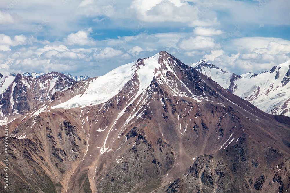 The majestic peak of the Soviets. Height 4317 meters. View from Tourist Peak