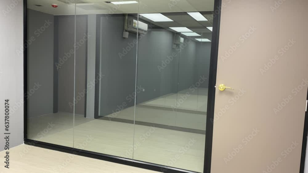 Empty interior office room clean window glass brown door panning shot Empty interior office room clean window glass brown door panning shot