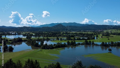 Intermittent Lake of Cerknica in Slovenia. Aerial crane of beautiful natural landscape. photo