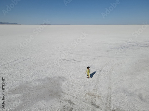 Captured by drone Bonneville Salt flats, a woman in the middle