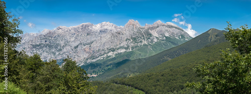 Fototapeta Naklejka Na Ścianę i Meble -  Panoramic view at the Picos de Europa, or Peaks of Europe, a mountain range extending for about 20 km, forming part of the Cantabrian Mountains in northern Spain