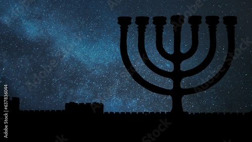 Menorah Seven Branched Candelabrum  by Night, Time Lapse with Stars and Milky Way in Background photo