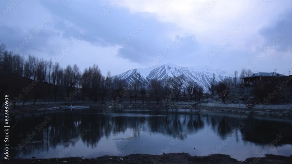 Himalayan Mountain range with Nako lake in foreground in Kinnaur Valley Himachal Pradesh India