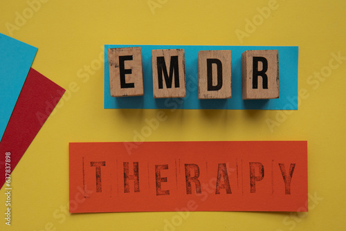 Words EMDR and therapy. Eye Movement Desensitization and Reprocessing psychotherapy treatment concept.