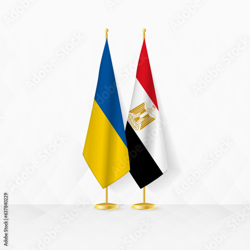 Ukraine and Egypt flags on flag stand, illustration for diplomacy and other meeting between Ukraine and Egypt.