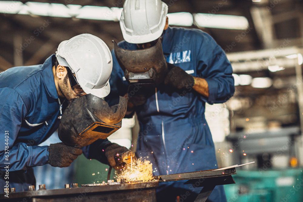 welding worker team working arc weld metal joint production in heavy industry danger and risk workplace with eyes safety equipment welding worker team working arc weld metal joint production in heavy industry danger and risk workplace with eyes safety equipment
