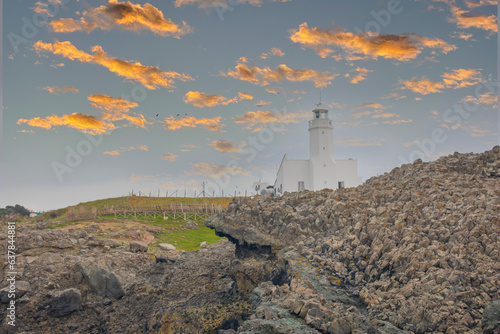 Inceburun Lighthouse is an active lighthouse on the Black Sea coast in Sinop, Turkey. In 1863, a masonry lighthouse was built in Inceburun, on the northernmost rocks of Anatolia. photo