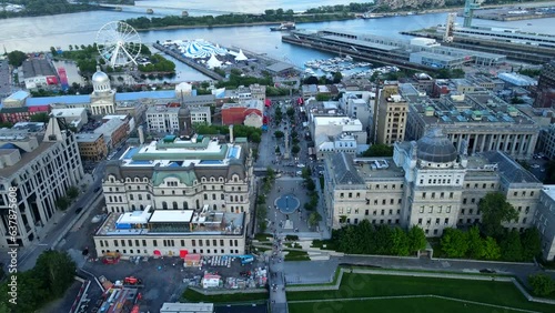 Aerial shot drone flies over city hall down Place Jacques Cartier toward the Old Port photo