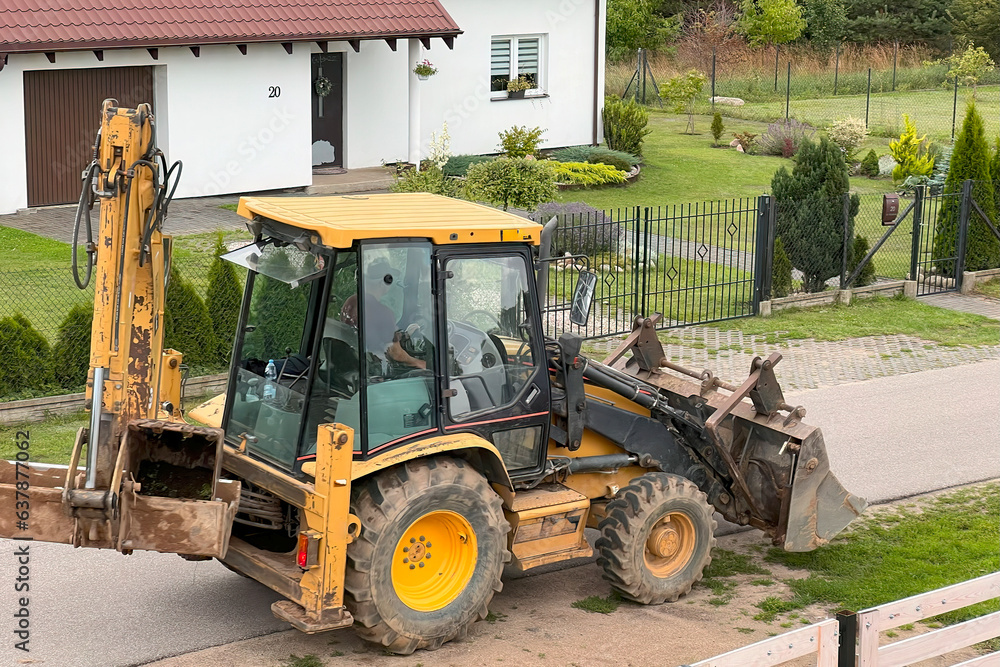 Construction Progress. Powerful Yellow Excavator in Action