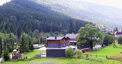 Beautiful Background in the Carpathians. Colorful Summer Landscape in a Mountain Village. Carpathians, Ukraine, Tatariv Village. photo