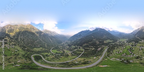 Aerial View of Swiss Mountain curvy highway between the mountains . Mesocco, Swizerland. 