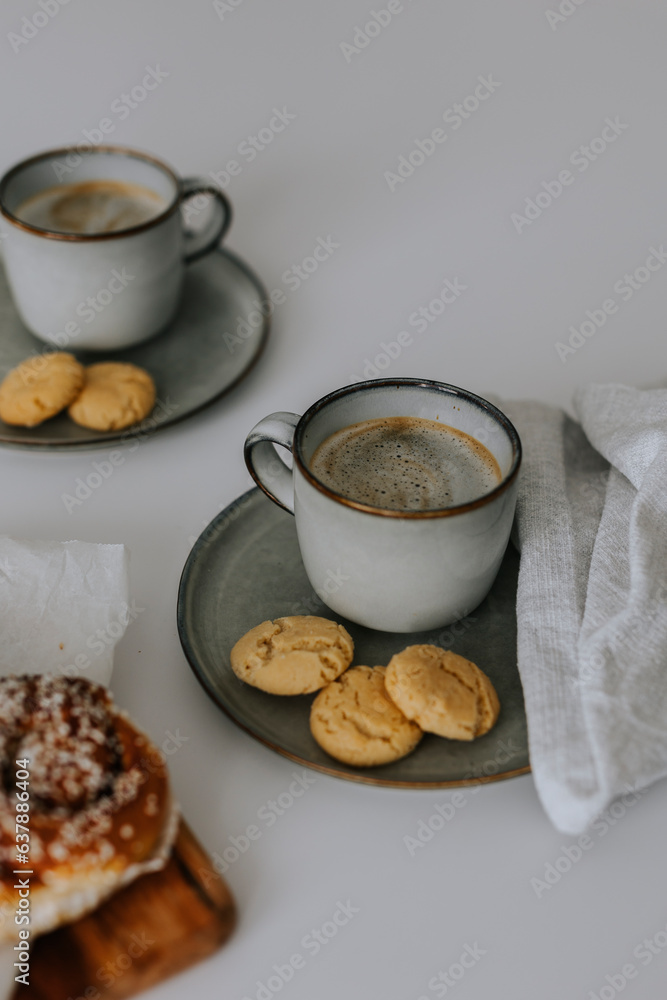Coffee with freshly baked cookies on table Coffee with freshly baked cookies on table