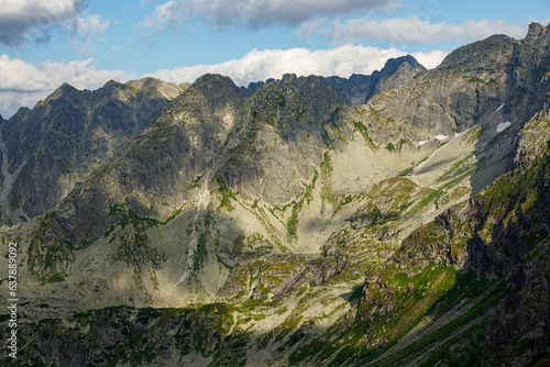 Fototapeta Naklejka Na Ścianę i Meble -  Top of a stone mountain close up on a summer sunny day with blue sky. Poland, Zakopane, Tatry