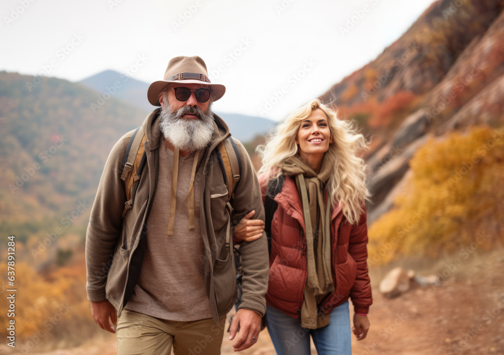 Fototapeta premium active mature caucasian couple hiking travelling in mountains with backpack, Generative AI