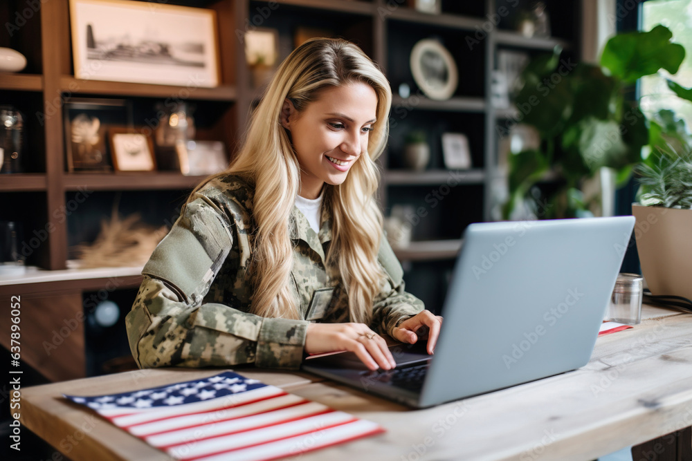 Patriotic female soldier video chatting with her family on a laptop Patriotic female soldier video chatting with her family on a laptop