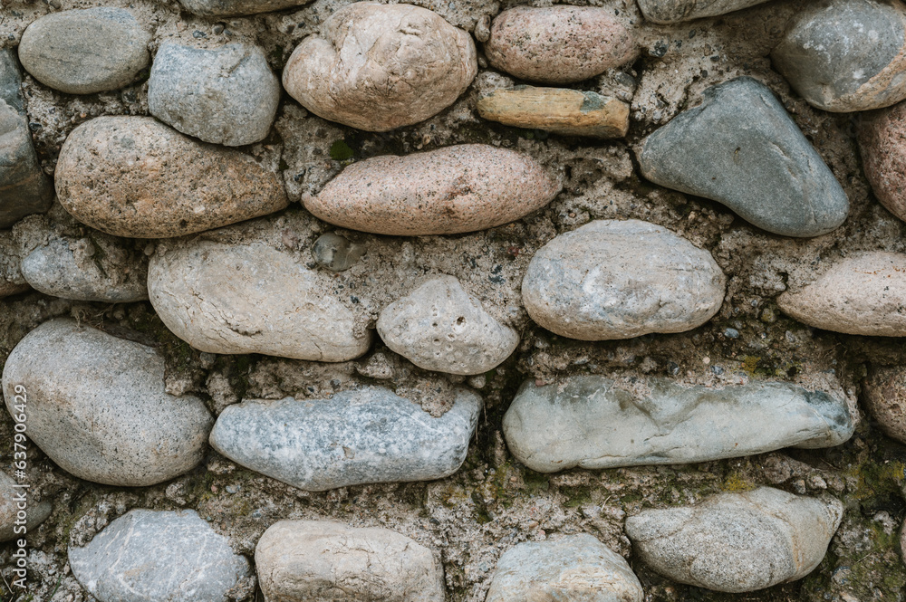 texture of concrete wall with stones and cobblestones texture of concrete wall with stones and cobblestones