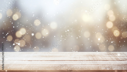 empty wooden board table with blur snow falling background for festive Christmas holiday and winter product advertisement