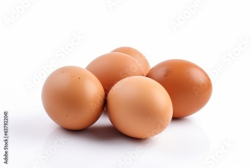 A stack of brown eggs