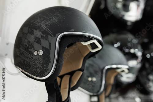 Off-road protective motorcycle helmets are sold in the store. photo