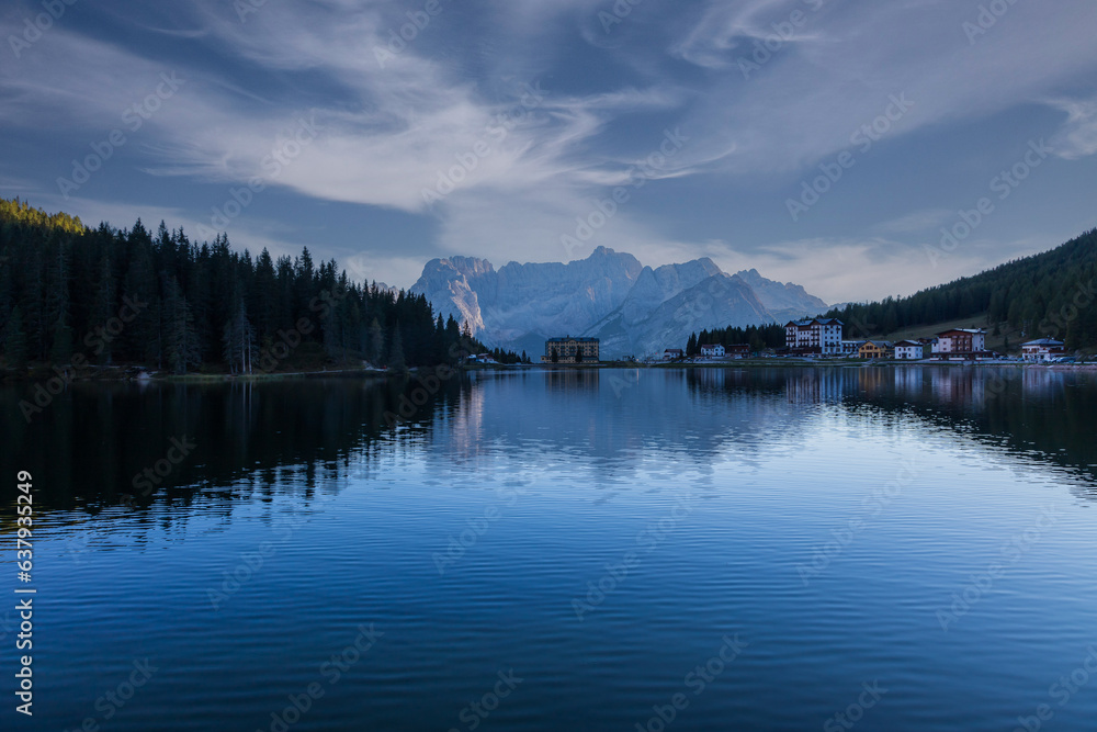 Lake Misurina in the Italian Dolomites. The mountains are reflected in the lake.