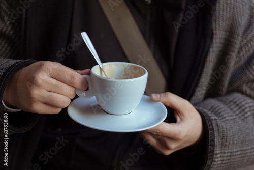 person with coffee cup