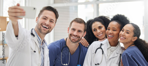 Fotografie Doctor, selfie and group with smile for social media and profile picture in hospital