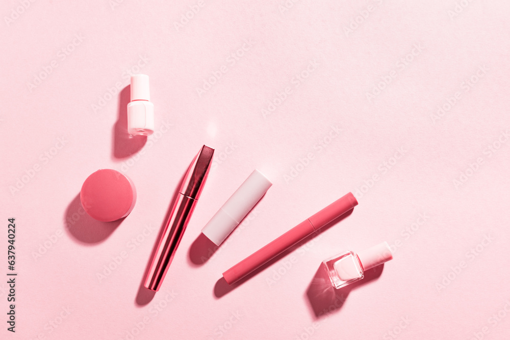 Set of decorative cosmetics on pink background Set of decorative cosmetics on pink background