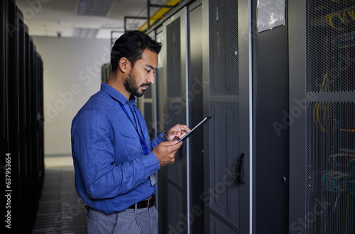 Man, tablet and technician in data center, research and programming. Information technology, reading and engineer in server room, networking for maintenance and coding software of system admin typing