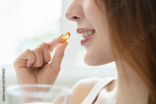 Nourishing the Body  Embracing Wellness  A Person Taking Fish Oil Supplements for Optimal Health and Vitality