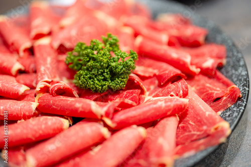 Slice of the fresh raw beef for shabu shabu