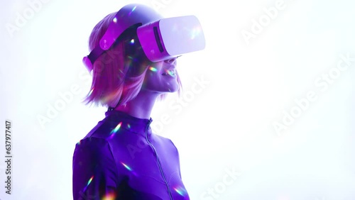 Beautiful woman with purple hair in futuristic costume over white background. Girl in glasses of virtual reality. 