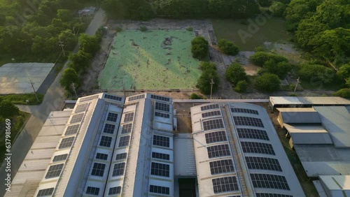 solar energyAerial view of a solar panel on building roof top. Part of reduce reuse and restore. Renewable energy concept photo