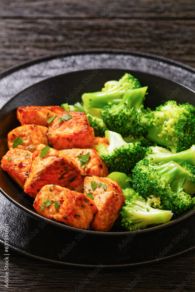fried salmon bites with steamed broccoli florets fried salmon bites with steamed broccoli florets