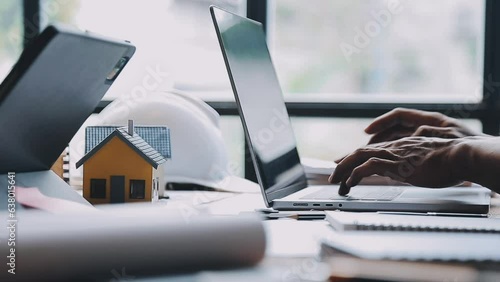 Wallpaper Mural Construction and structure concept of engineer working drawing on blueprint meeting for project working with partner on model building and engineering tools in working site, construction concept. Torontodigital.ca