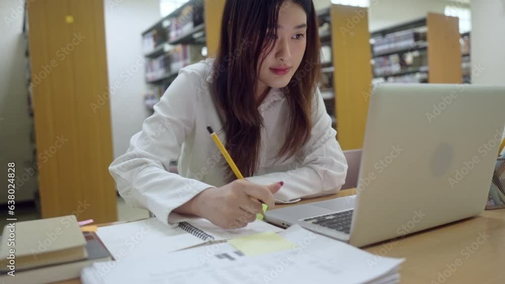 Young woman student busy study make notes in notebook and using laptop concentrated online training course technology education
Young woman student busy study make notes in notebook and using laptop concentrated online training course technology education