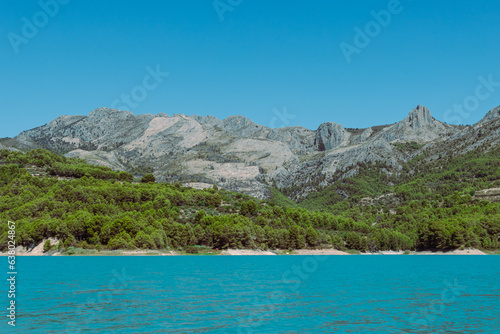 A beautiful mountain landscape, a view of the mountains and a lake with turquoise water, there is a place for an inscription. High quality photo