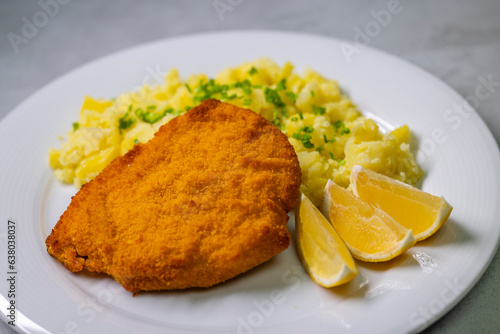 Chicken cutlet with couscous and lemon