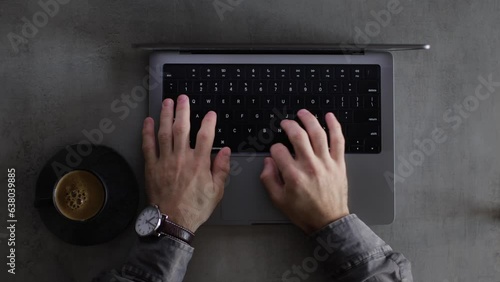 Businessman typing on a computer keyboard
