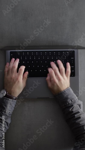Businessman typing on a computer keyboard