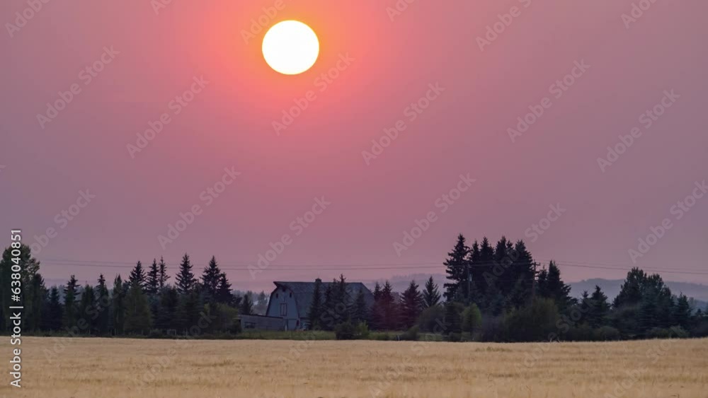Sunset at the mountain in the rural countryside agricultural field. pinky sky atmosphere with silhouette trees and mountains background. sky timelapse natural landscape 4k Sunset at the mountain in the rural countryside agricultural field. pinky sky atmosphere with silhouette trees and mountains background. sky timelapse natural landscape 4k