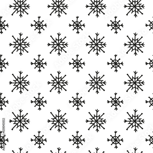 Seamless pattern with hand drawn snowflakes.