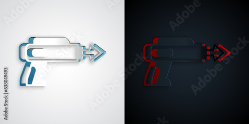 Paper cut Fishing harpoon icon isolated on grey and black background. Fishery manufacturers for catching fish under water. Diving underwater equipment. Paper art style. Vector