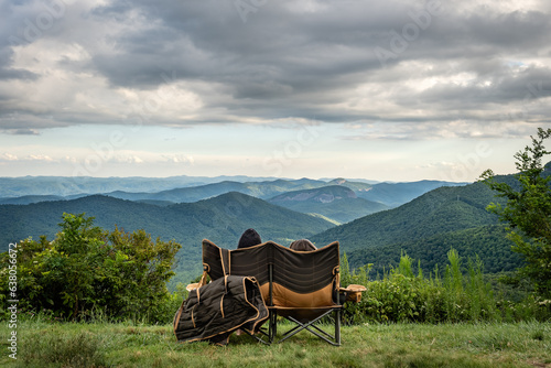 Photography Couple sitting overlooking the Blue Ridge Mountains, Looking Glass Rock near Bre