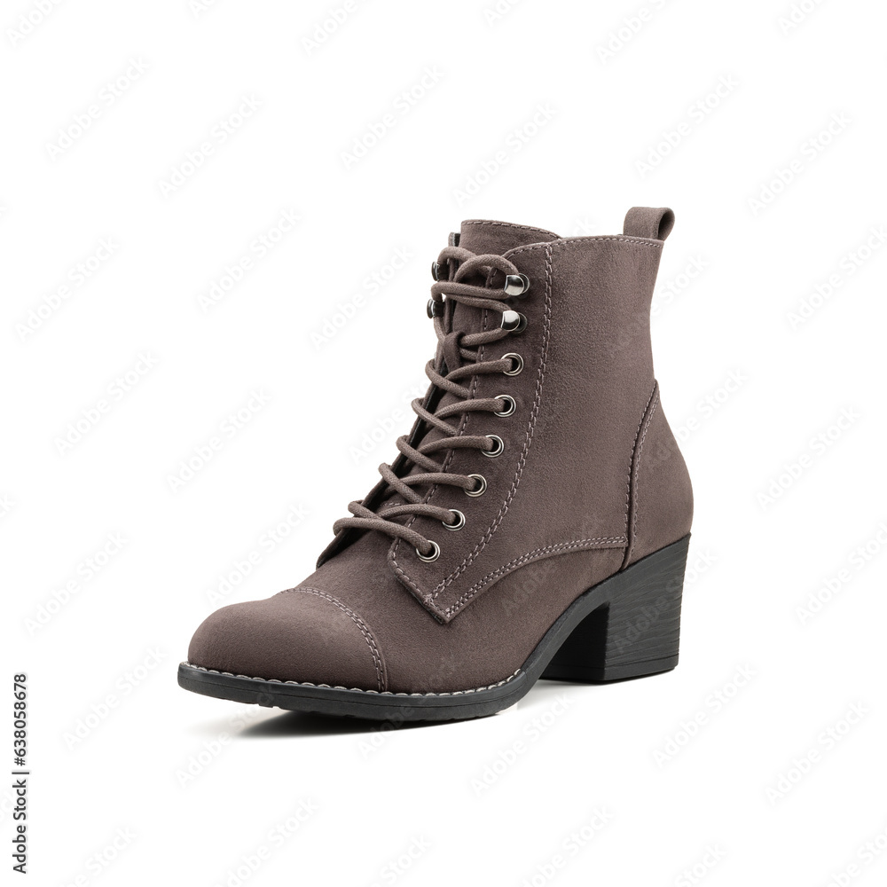 Women's classic shoe with brown suede laces on a wide heel on a white background with a shadow. Photo. Women's classic shoe with brown suede laces on a wide heel on a white background with a shadow. Photo.