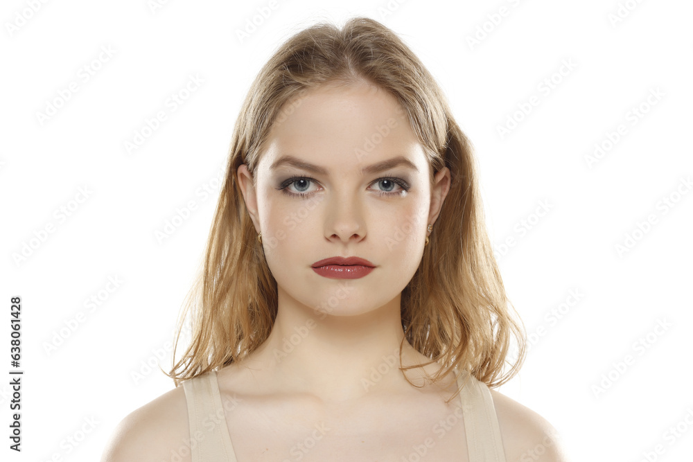Portrait of young beautiful blonde woman with makeup on white background Portrait of young beautiful blonde woman with makeup on white background